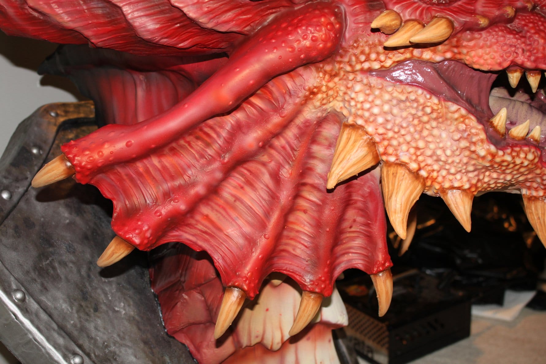 The majestic restoration of this red dragon's mounted head