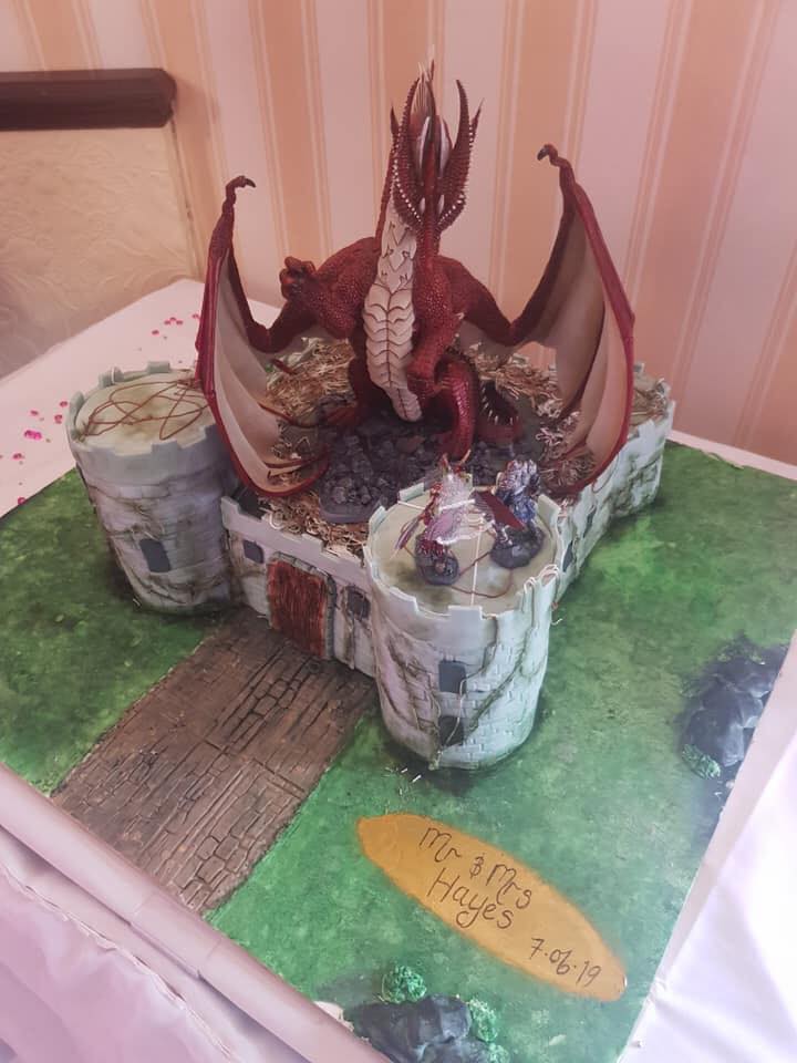 Dragon and castle wedding cake