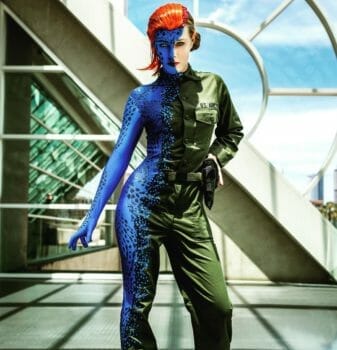 Mystique in mid-transformation cosplay is incredible