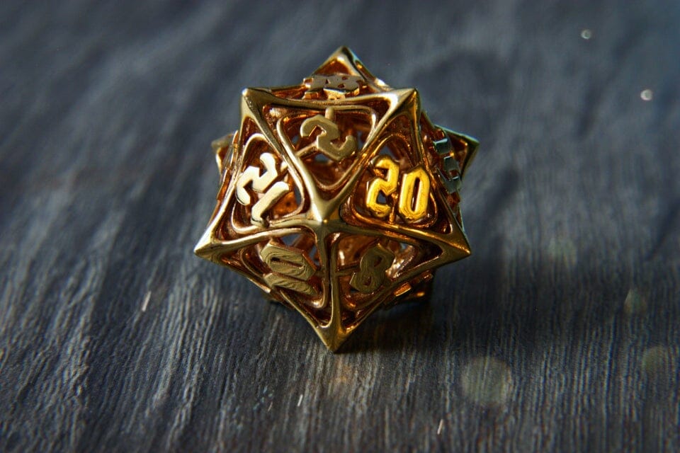 This spiky d20 has been made from 14 karat gold. 