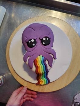 mind flayer vomiting a snap rainbow cake