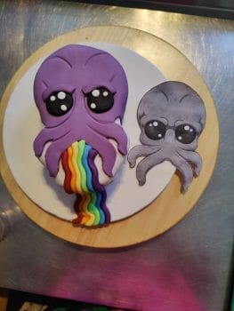mind flayer vomiting a snap rainbow cake