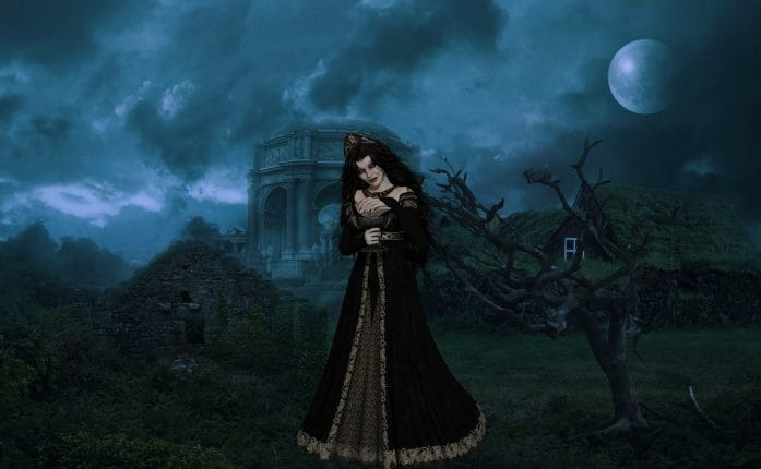 Vampire stands in front of dark gothic mansion