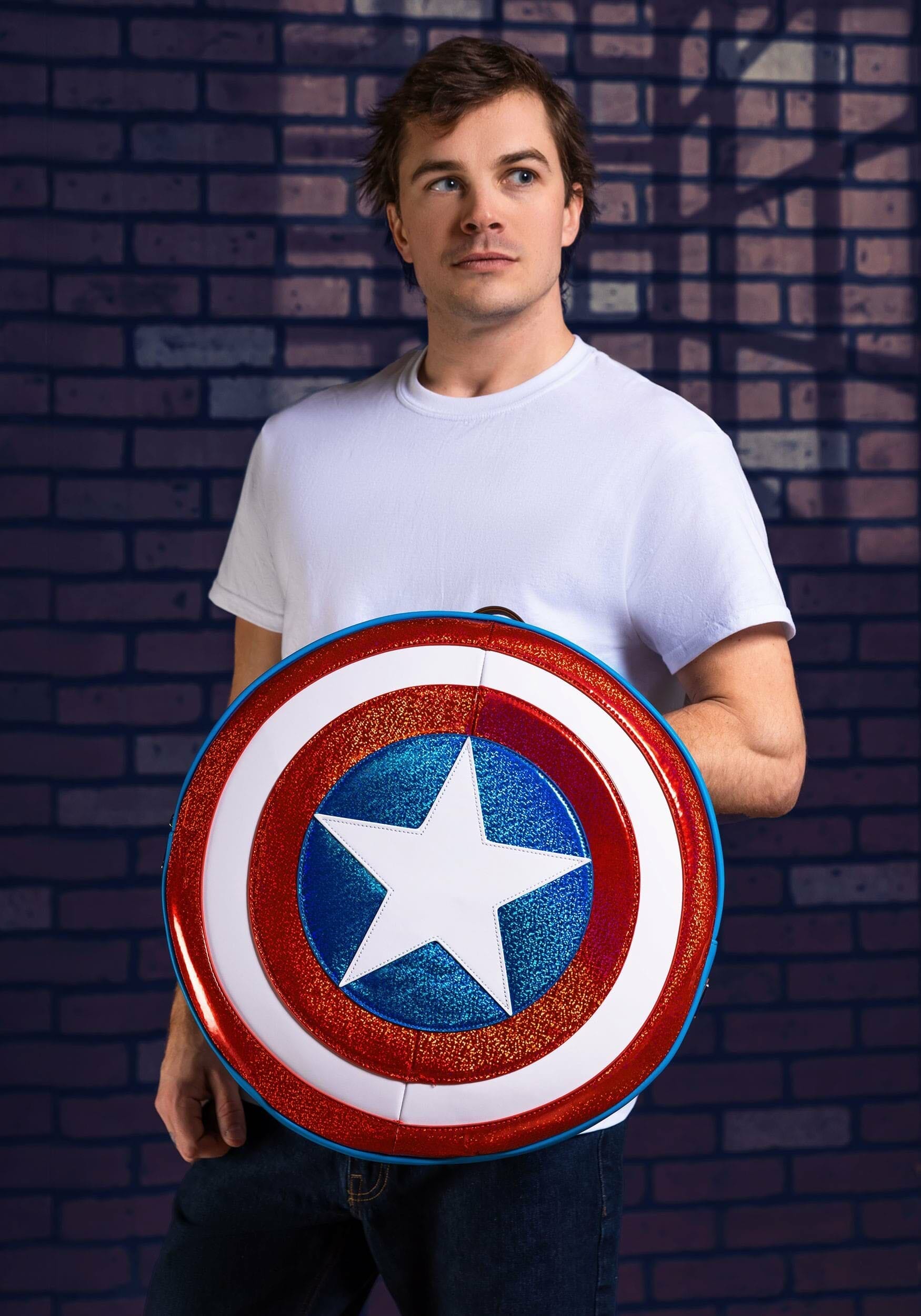 Man models with Captain America shield bag