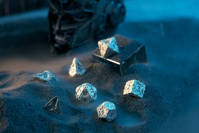 Interstellar metal dice in sand