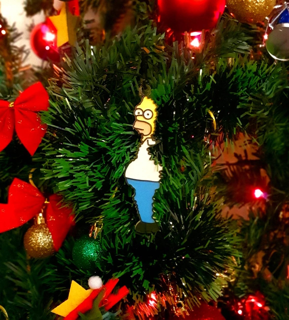 Homer vanishing into a bush/tree